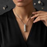 Silver Belle Fever Cylinder Cremation Necklace worn elegantly — a personal and comforting keepsake of everlasting love and remembrance.