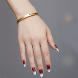 Personalised Endless Open Cuff Bangle by Belle Fever — sleek gold design worn with sophistication, symbolising eternal love, unity, and timeless beauty.