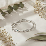 Personalised Endless Ties Name Bracelet with Birthstone by Belle Fever — silver chain surrounded by florals, crafted to symbolise unity and heartfelt connection.