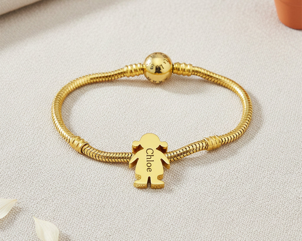 Belle Fever moments bracelet with girl charm on a table — a meaningful personalised keepsake for mums, grandmas, and families cherishing their little ones