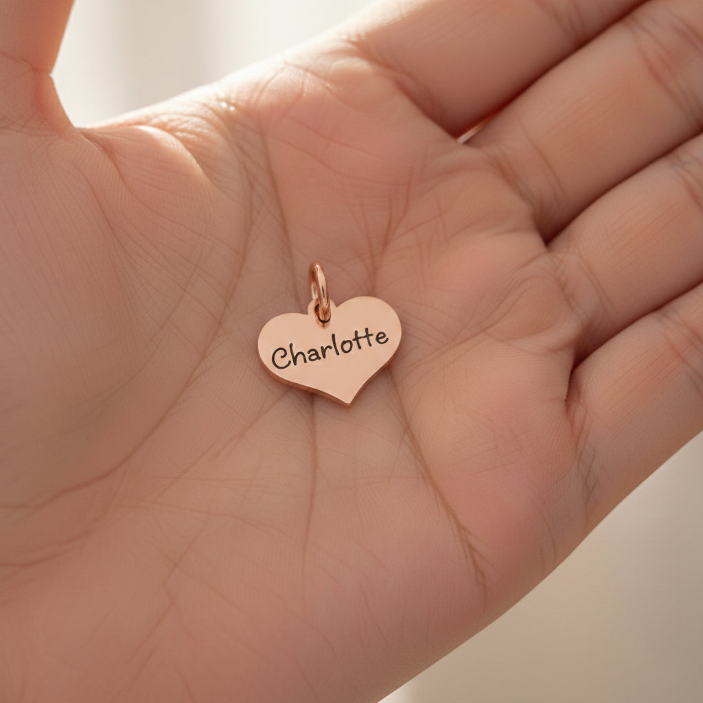 belle fever personalized heart charm for keyring held in hand, engraved name keepsake full of meaning
