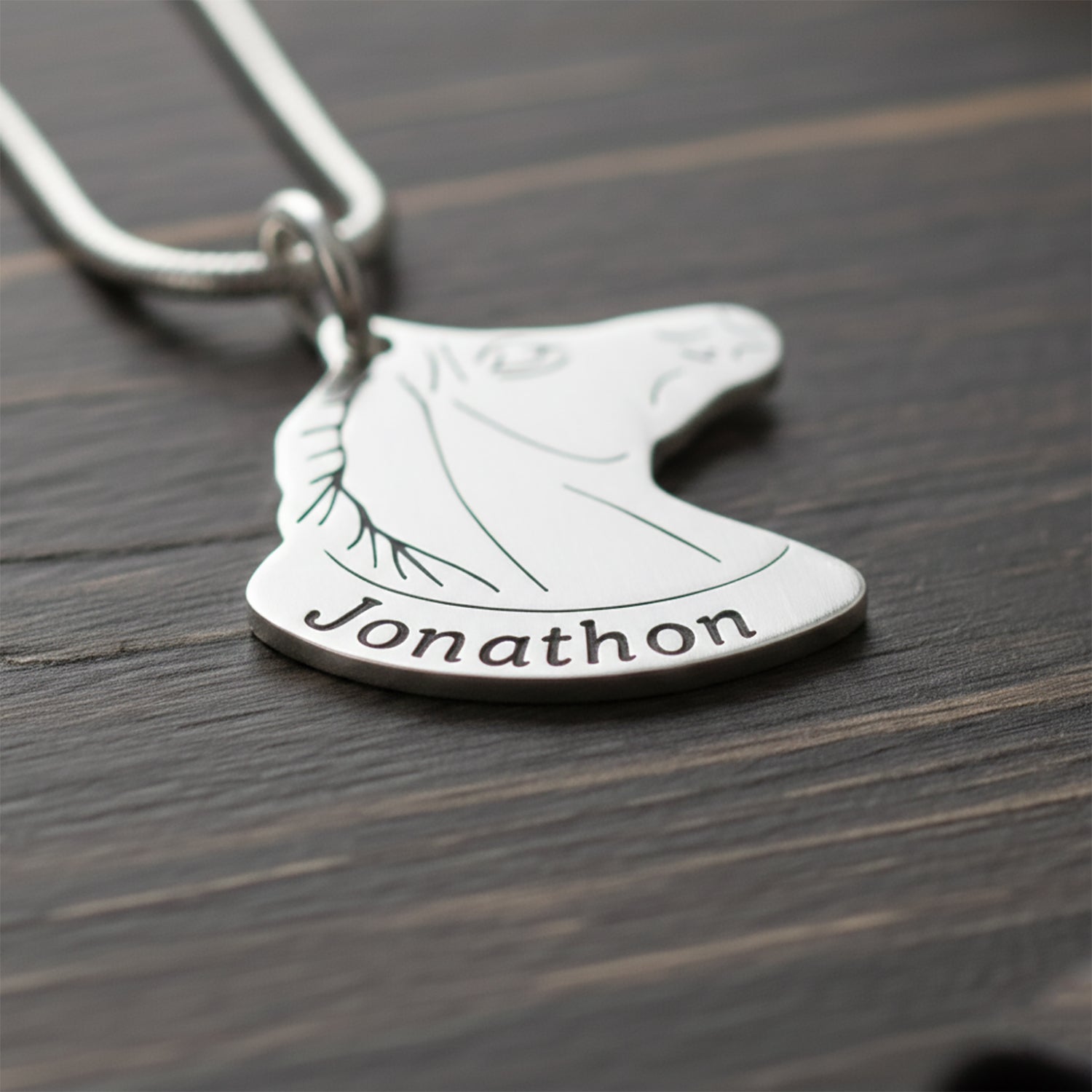 Horse Head Necklace with Custom Name by Belle Fever silver macro close-up showing engraved name Jonathon, personalised horse pendant jewellery, meaningful equestrian gift.