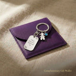 Kids personalised tag keyring displayed with gift wallet packaging, family jewellery gift option