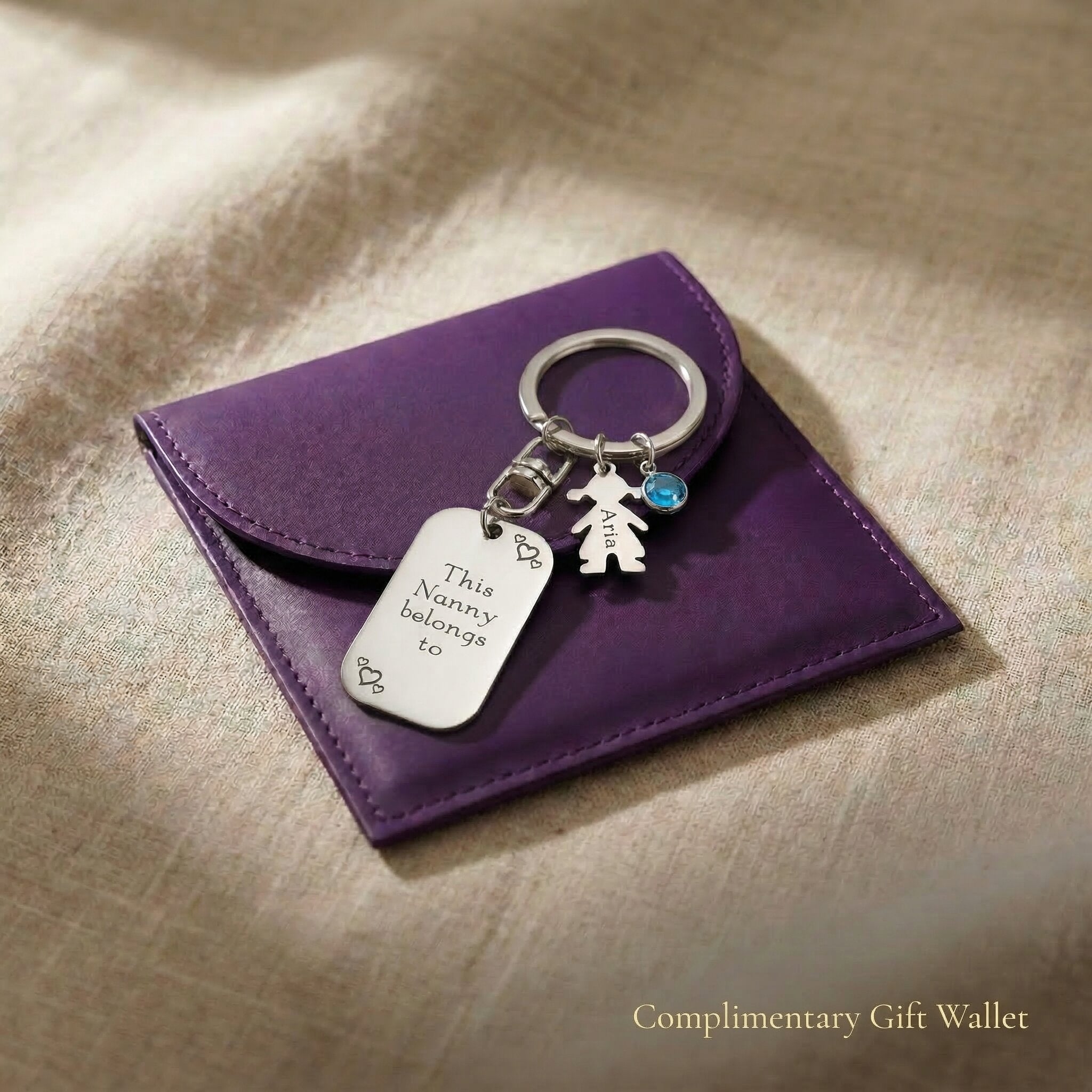 Kids personalised tag keyring displayed with gift wallet packaging, family jewellery gift option