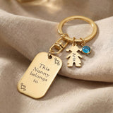 Kids personalised tag keyring in gold with engraved message, child charm and birthstone