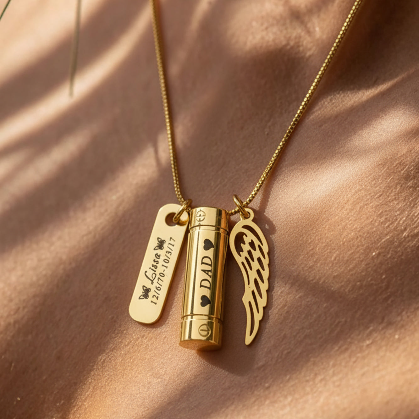 Belle Fever Memory Cremation Necklace — gold memorial pendant with engraved message and angel wing, a loving tribute to those forever in your heart.