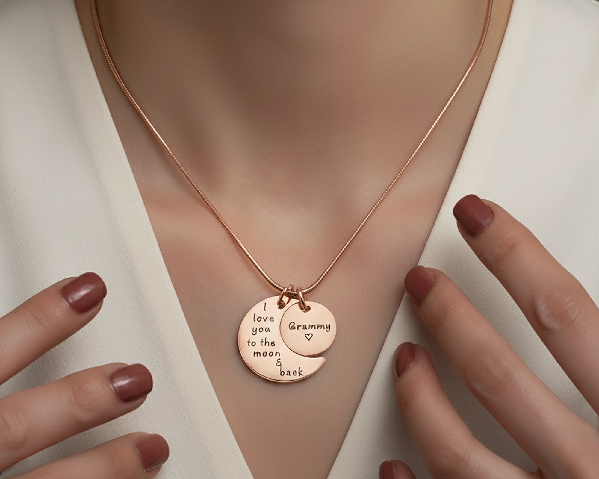 Belle Fever Moon and Back Necklace — gold engraved pendant worn close to the heart, a meaningful keepsake expressing ‘I love you to the moon and back’ with timeless warmth.