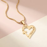 Trust in Him heart cross necklace by belle fever laid flat, minimalist Christian necklace symbolizing belief, grace, and divine connection