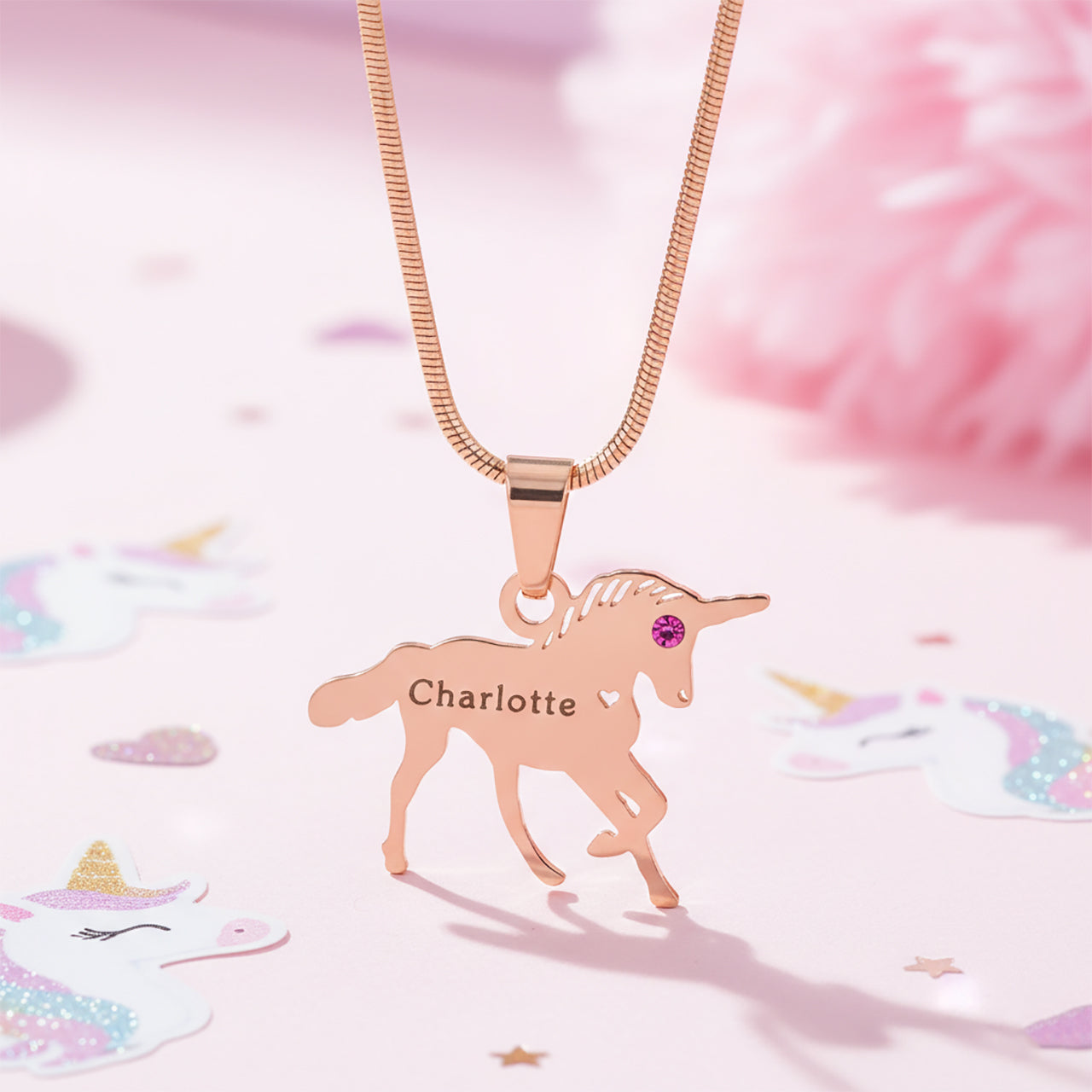 Rose gold Belle Fever unicorn necklace with custom name. a keepsake gift combining fantasy, sparkle, and sentimentality.