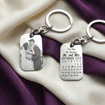 Personalized photo tag keyring with engraved calendar, shown as a wedding or anniversary keepsake