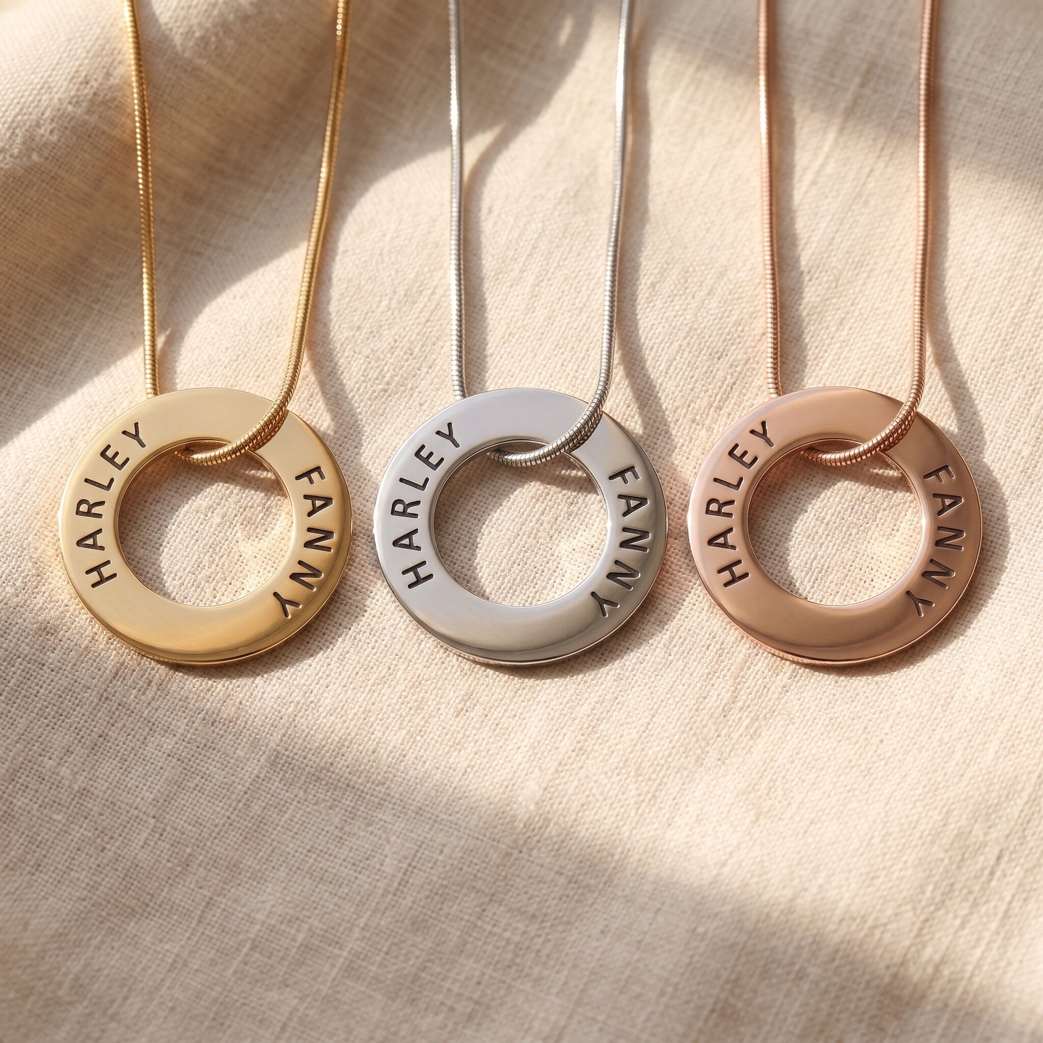 Always Forever necklace tone comparison showing gold, silver and rose gold engraved finishes