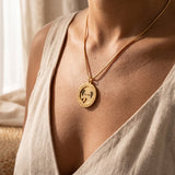 Woman wearing always on my mind necklace, layered keepsake jewellery symbolising love and remembrance