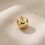 Gold apple charm for Moments Bracelet with polished finish and minimalist luxury jewelry design