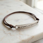 Belle Fever bar cord bracelet with engraved silver bar, adjustable unisex personalised bracelet designed for meaningful everyday wear.