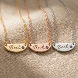 Beck name necklace in gold, silver and rose gold finishes with engraved bar pendant