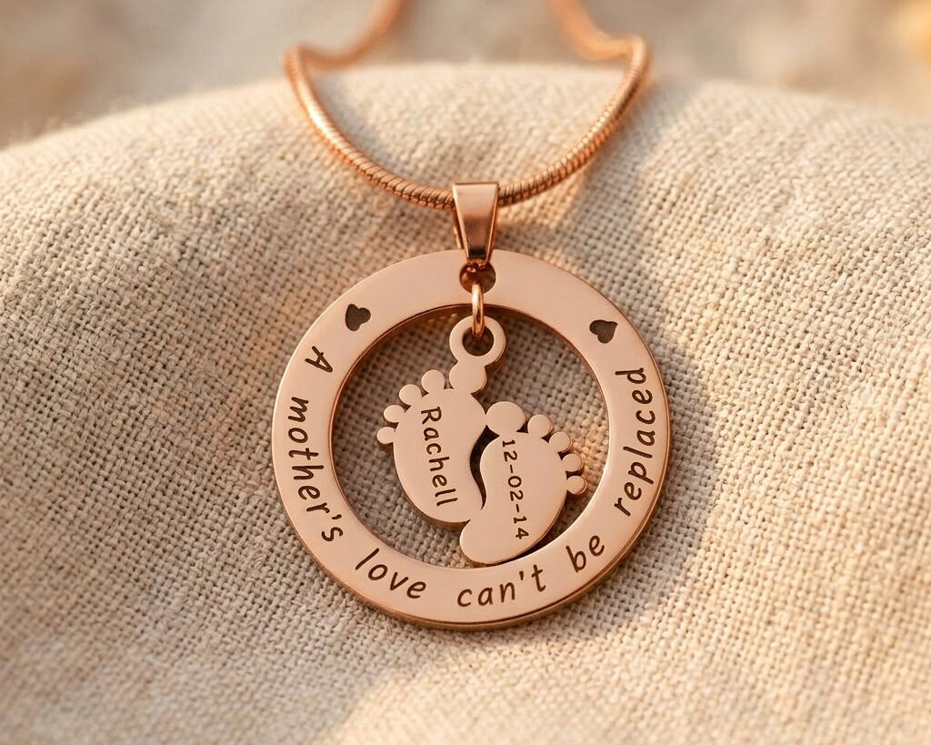 Rose Gold Can’t Be Replaced Necklace with engraved message and baby feet charm pendant