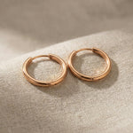 Rose gold chic sleeper hoop earrings with minimal round hoop design
