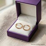 Chic sleeper hoop earrings presented in elegant jewelry gift box packaging