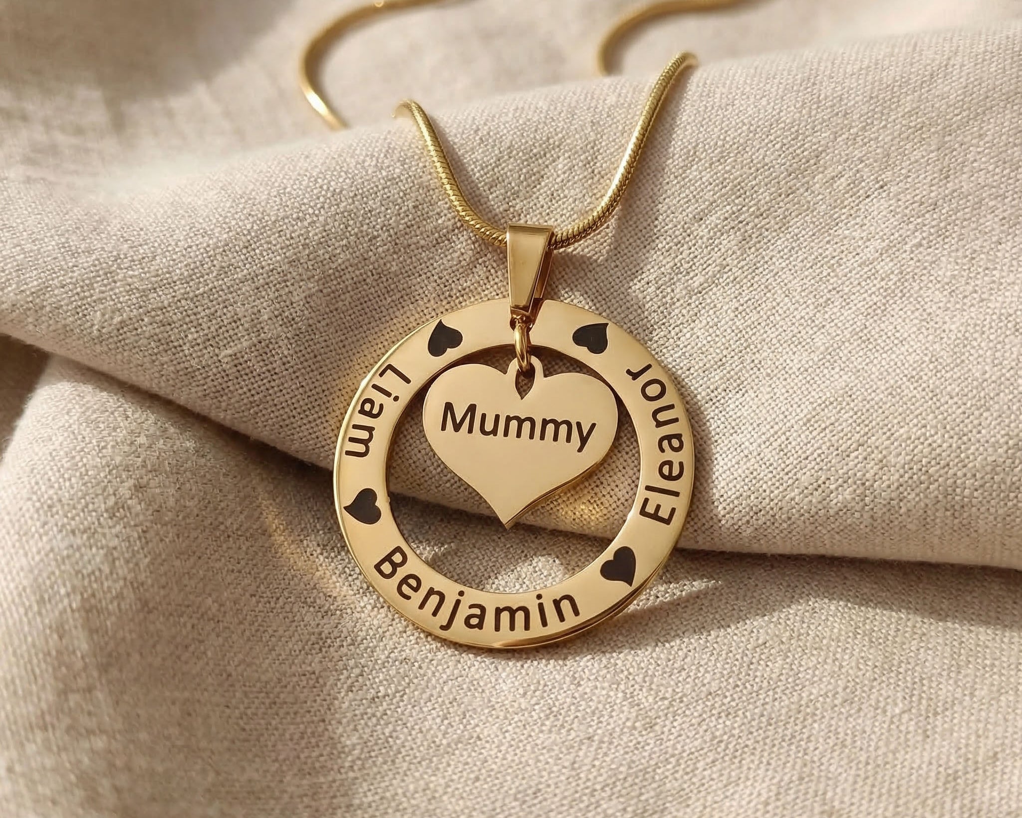 Gold Circle of Trust Necklace with engraved names and heart charm insert, elegant custom jewelry option