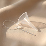 Cremation jewellery filling kit with funnel and pin for transferring ashes into memorial keepsake necklace