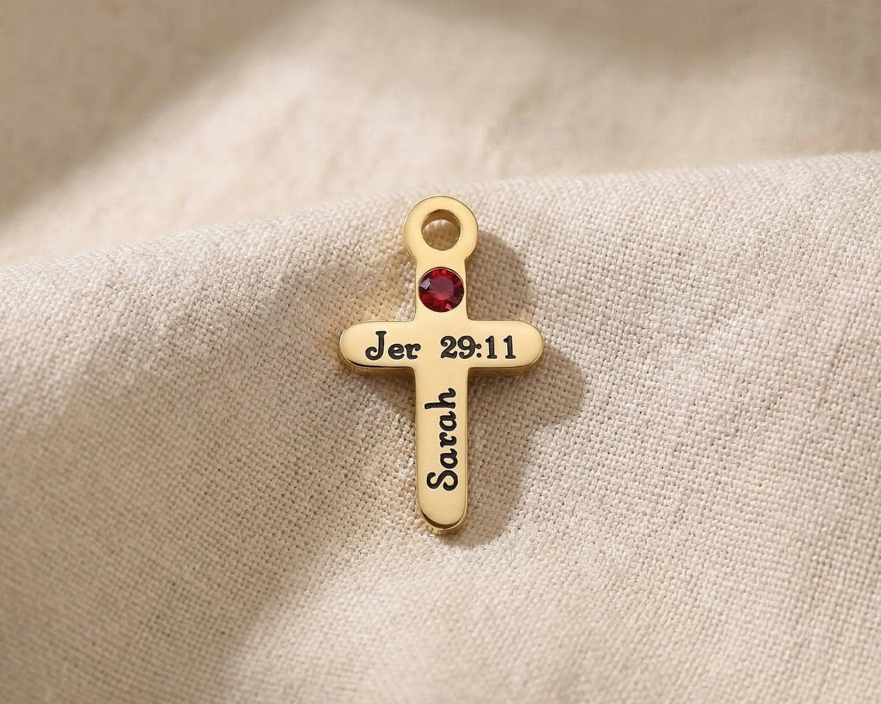 Gold cross birthstone charm for Dream Locket bracelet combining faith symbolism with personalized gemstone detail