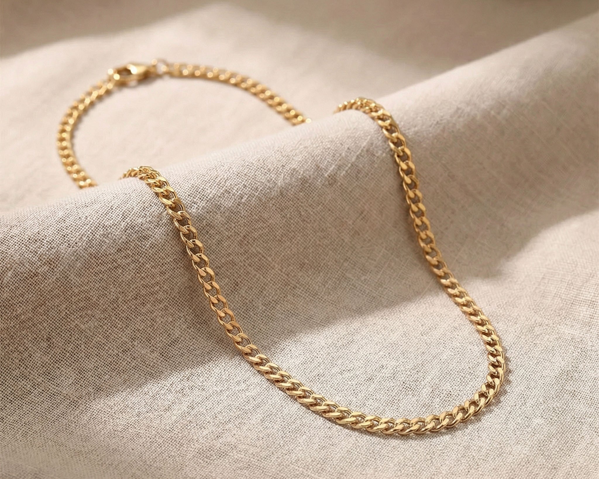 Gold curb chain necklace with classic flat interlocking link design