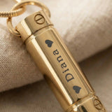 Close-up of Memory Cremation Necklace showing engraved message and polished pendant detail