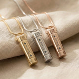 Cylinder cremation necklace in gold silver and rose gold finishes with urn pendant design