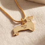 Dachshund dog necklace in gold with engraved detail, personalised dog lover jewellery design