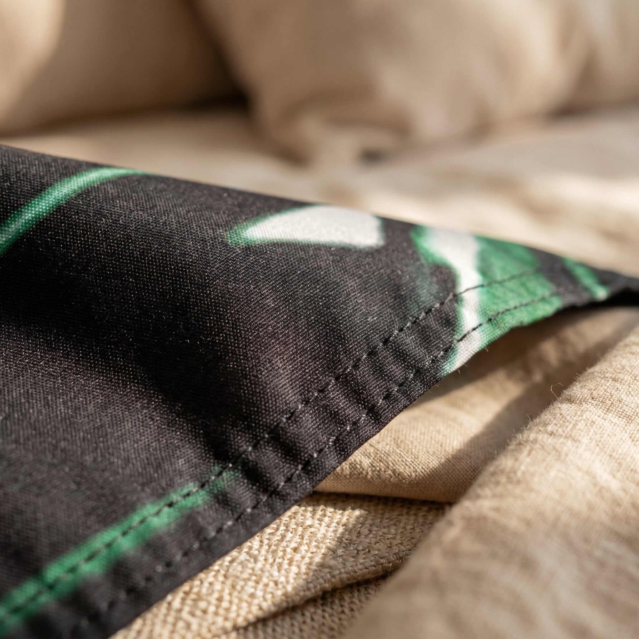 Close-up of personalised doona cover set fabric detail with custom print design and soft bedding texture