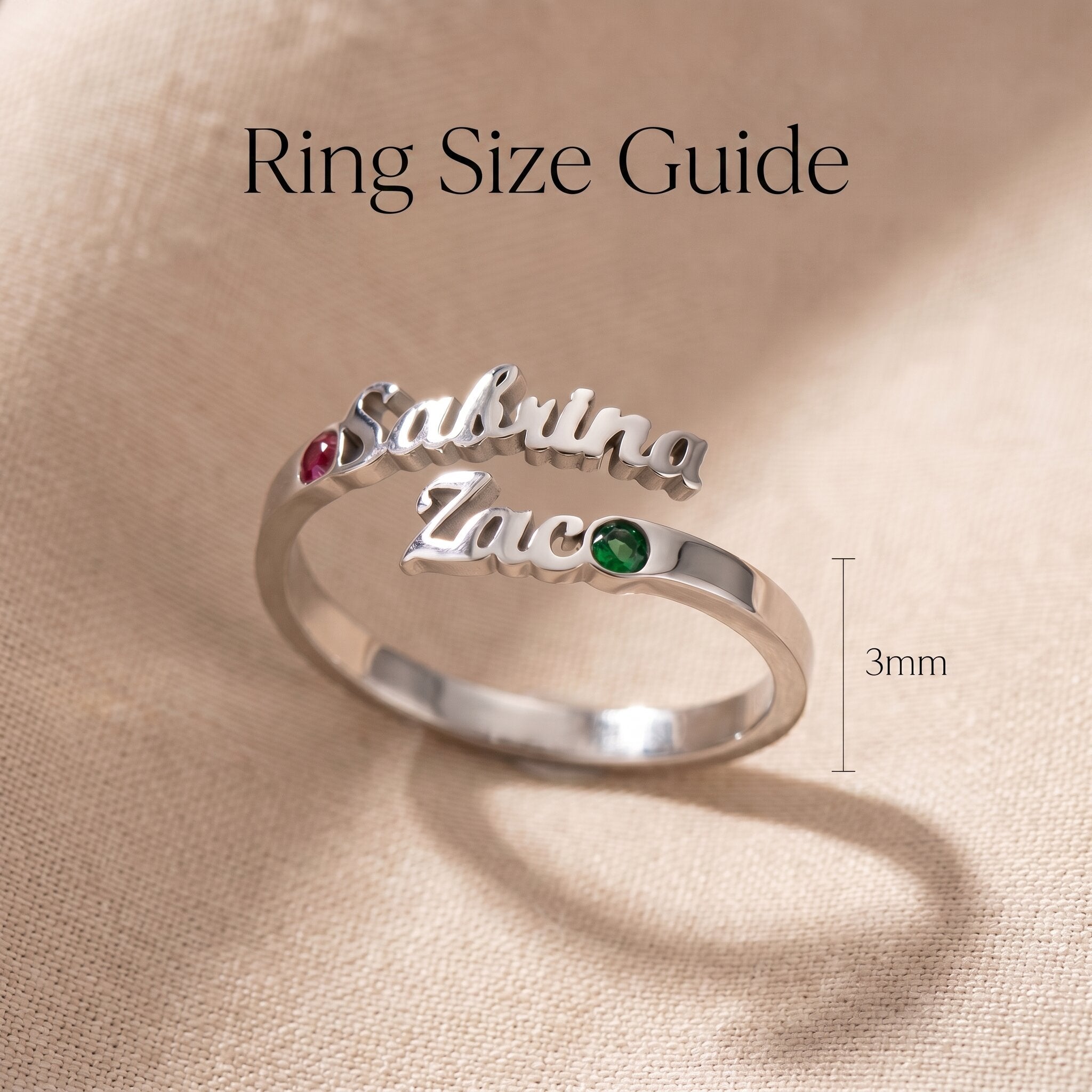Personalized double name silver ring displayed with ring size guide for custom jewelry fitting reference