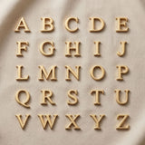 Personalized gold initial letter charms for Dream Locket bracelet with custom alphabet engraving options