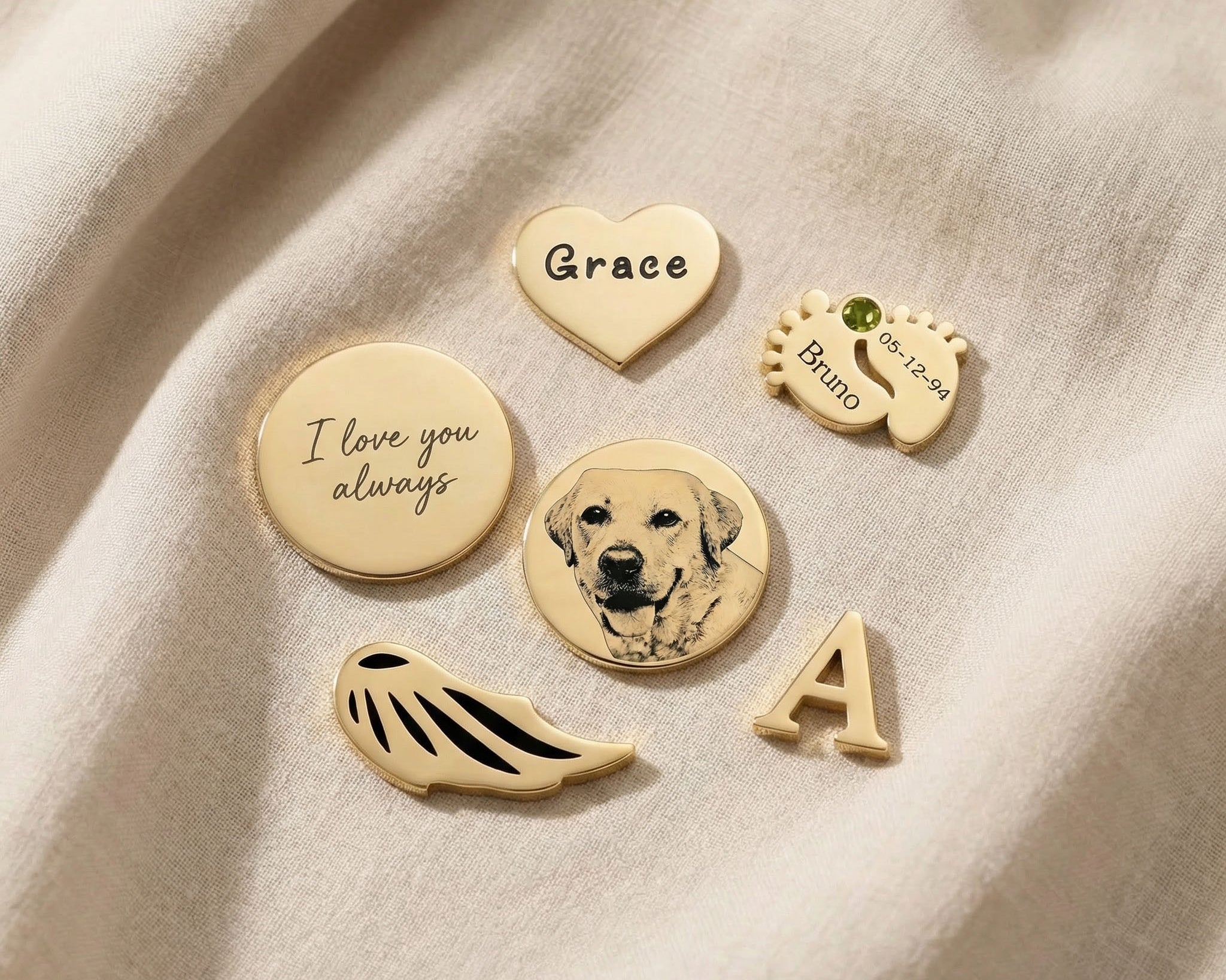 Dream locket charms in gold showing personalised inserts, initial charm, pet photo and engraved message options