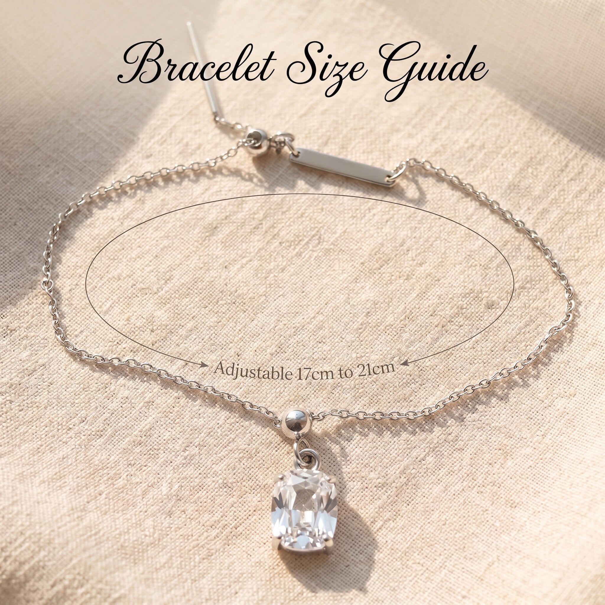 Empowerment bracelet size guide showing chain length and crystal charm proportions
