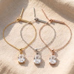 Empowerment bracelet tone comparison showing gold, silver and rose gold finishes with crystal charm