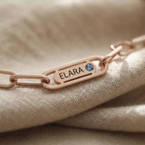 Close-up of Endless Ties Necklace showing engraved name on link with fine detail and polished finish