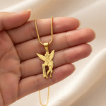 Fairy Name Necklace by Belle Fever — gold fairy pendant displayed in hand, a charming personalised keepsake necklace designed for children who love magic and fairytales.