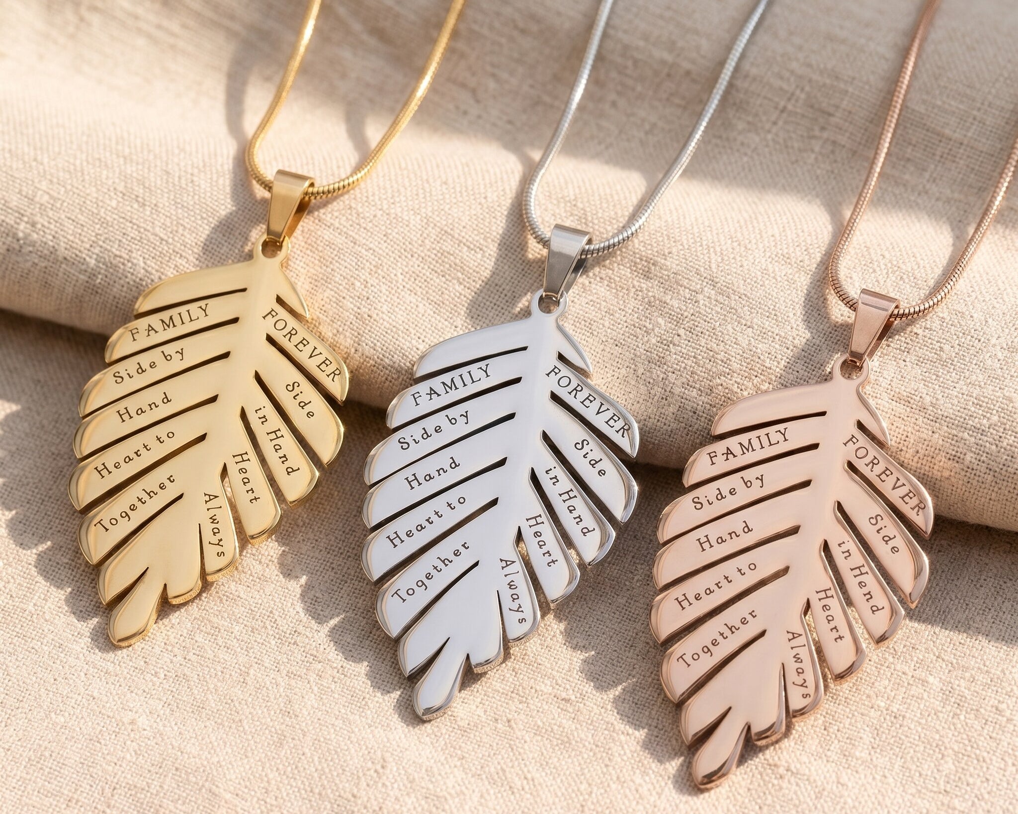 Family leaf necklace tone comparison showing gold, silver and rose gold finishes, personalised keepsake jewellery