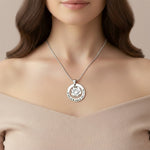 Personalized rose family necklace with engraved family names on model neckline, belle fever elegant family keepsake.