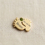 Gold baby feet birthstone charm for Dream Locket bracelet celebrating newborn milestones and family memories