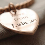 Close-up of Forever In My Heart Charm Bracelet with engraved heart charm, personalised jewellery detail