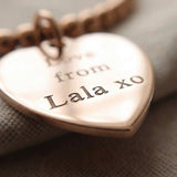 Close-up of Forever In My Heart Charm Bracelet with engraved heart charm, personalised jewellery detail