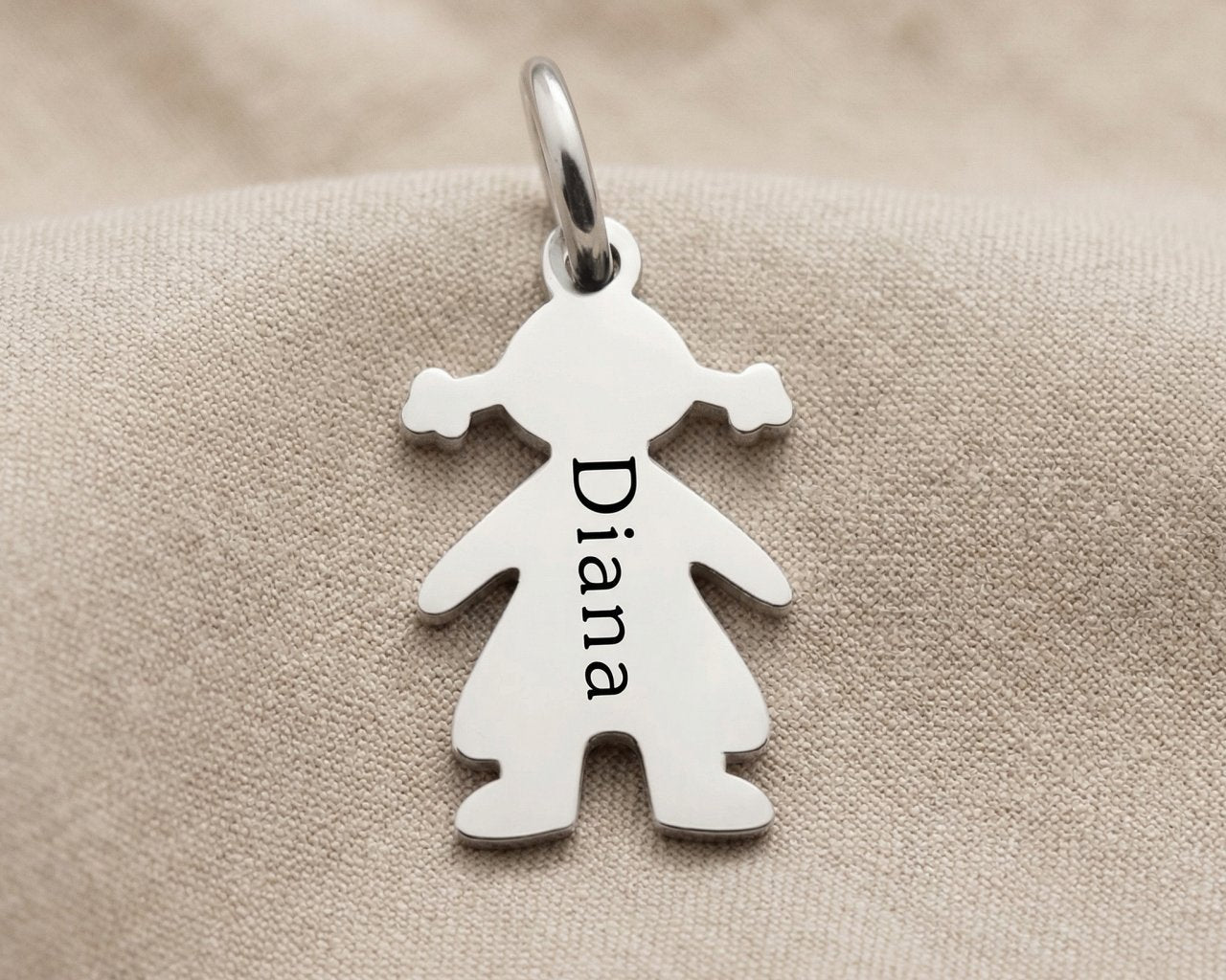 Personalized girl silhouette charm for keyring with engraved name and sentimental family keepsake design