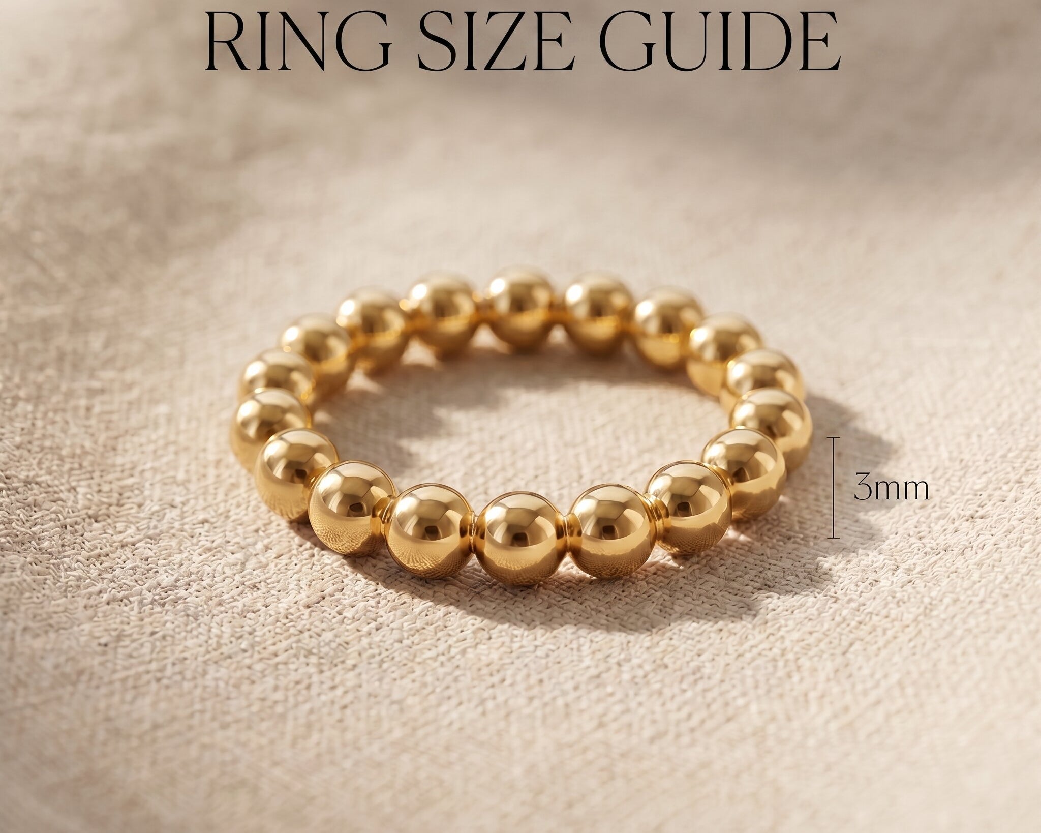 Golden link ring size guide showing band width and chain link design proportions