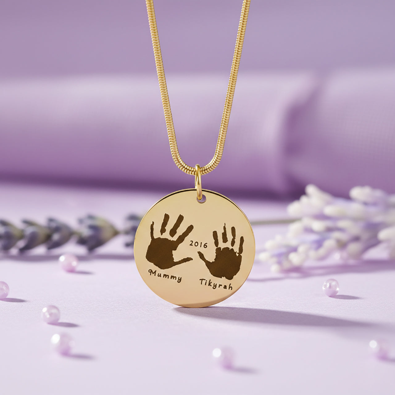 Hand on My Heart Necklace by Belle Fever —  engraved handprint pendant styled with lavender tones, a heartfelt memorial necklace keeping loved ones close