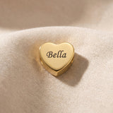 Personalized gold heart charm for Moments Bracelet with custom engraved name in elegant script style
