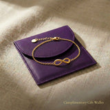 Infinity bracelet or anlet displayed with jewelry gift wallet packaging