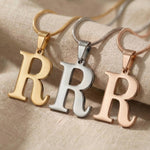 Initial Necklace tone comparison showing gold, silver and rose gold letter pendants