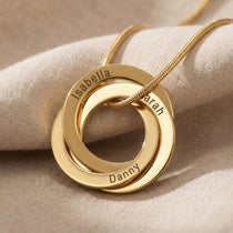 Interlinked Love Ring Necklace in gold with interlocking rings, personalised jewellery hero image