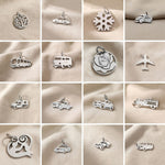 Keyring charms collection with vehicle, symbol and decorative charm options for personalised keyrings